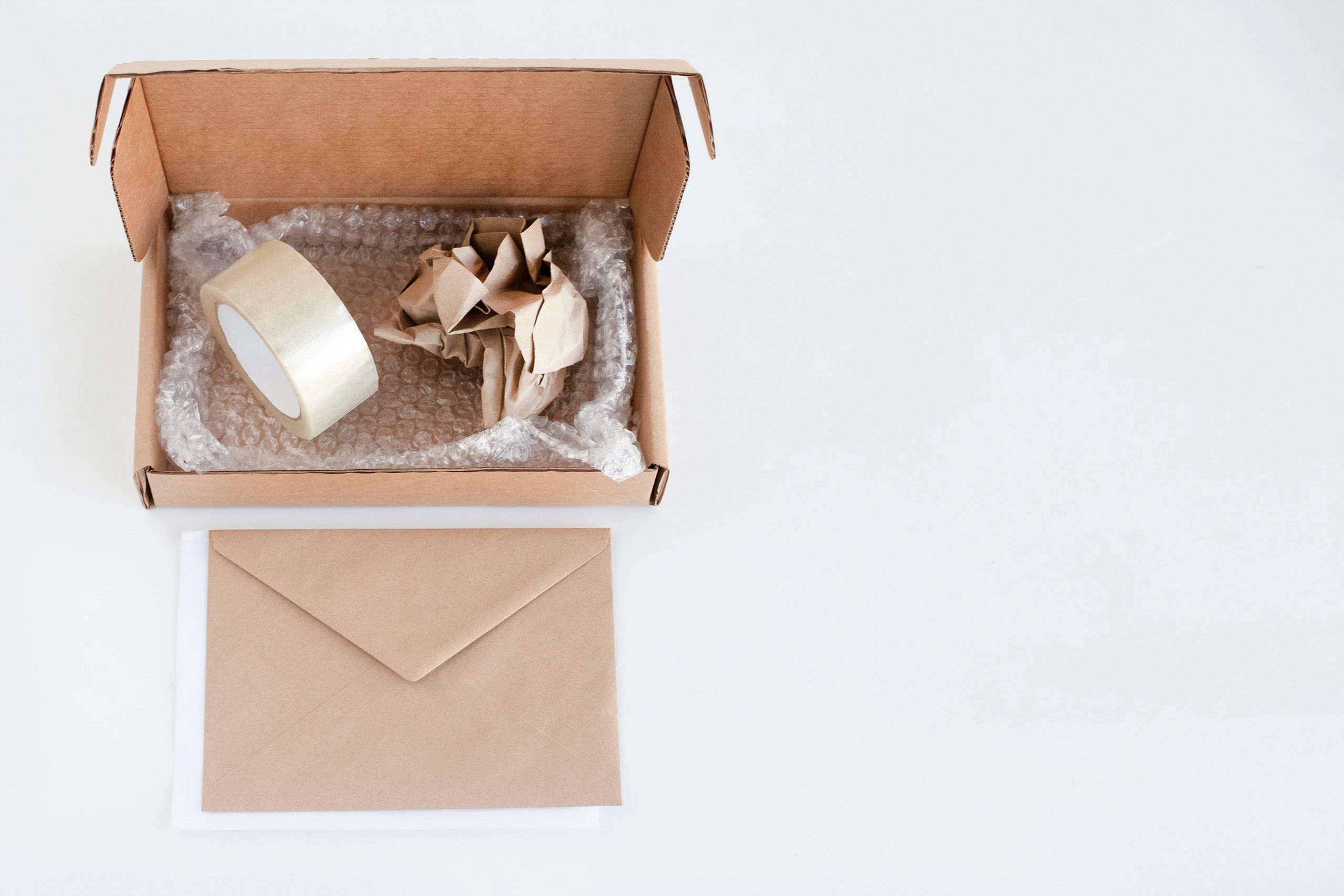 Packing supplies and open box with bubble wrap