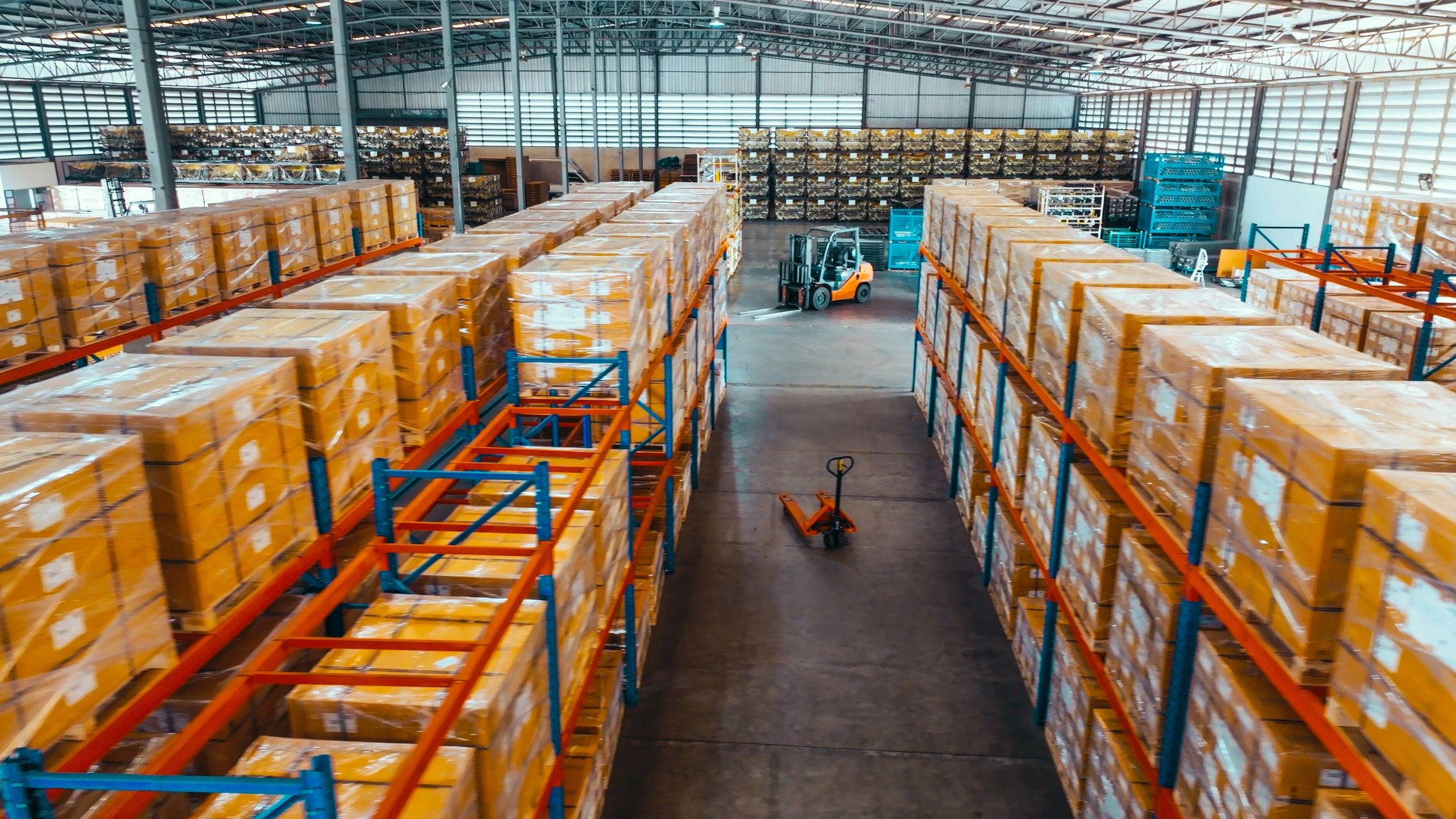 Warehouse shelves with packed parcels, representing shipping and logistics