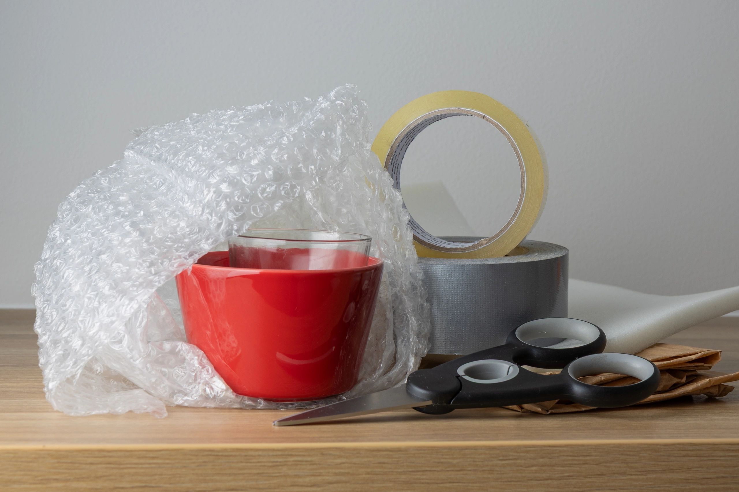 Packing supplies including boxes, tape, and protective materials for safe shipping